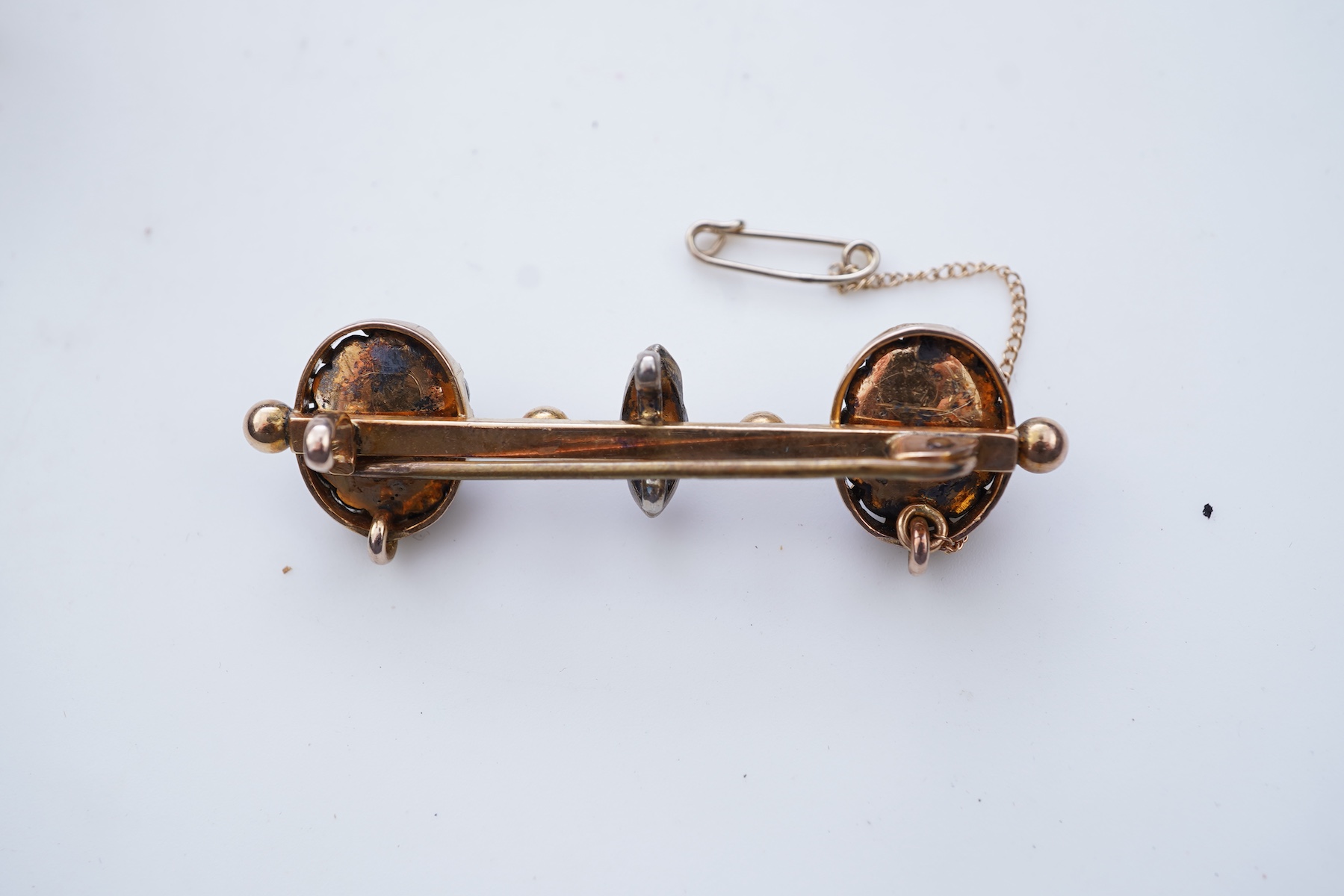 Three rings and a brooch